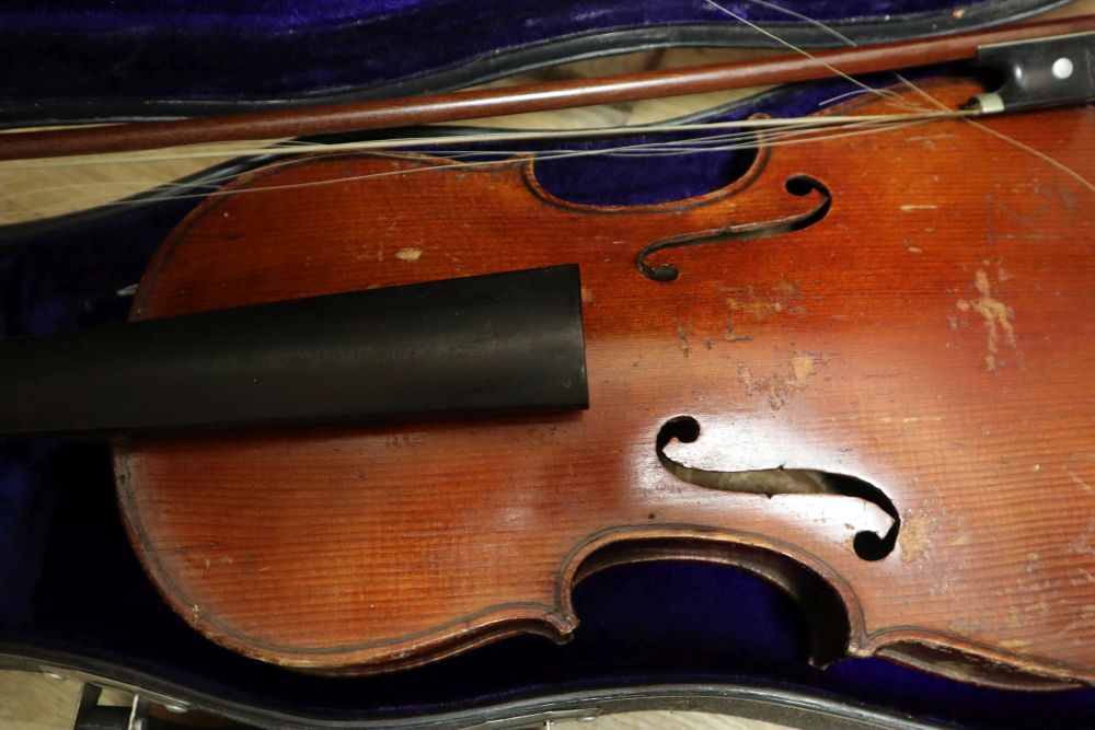 A Czech 3/4 size violin and a German 3/4 size violin, length of backs both 34cm
